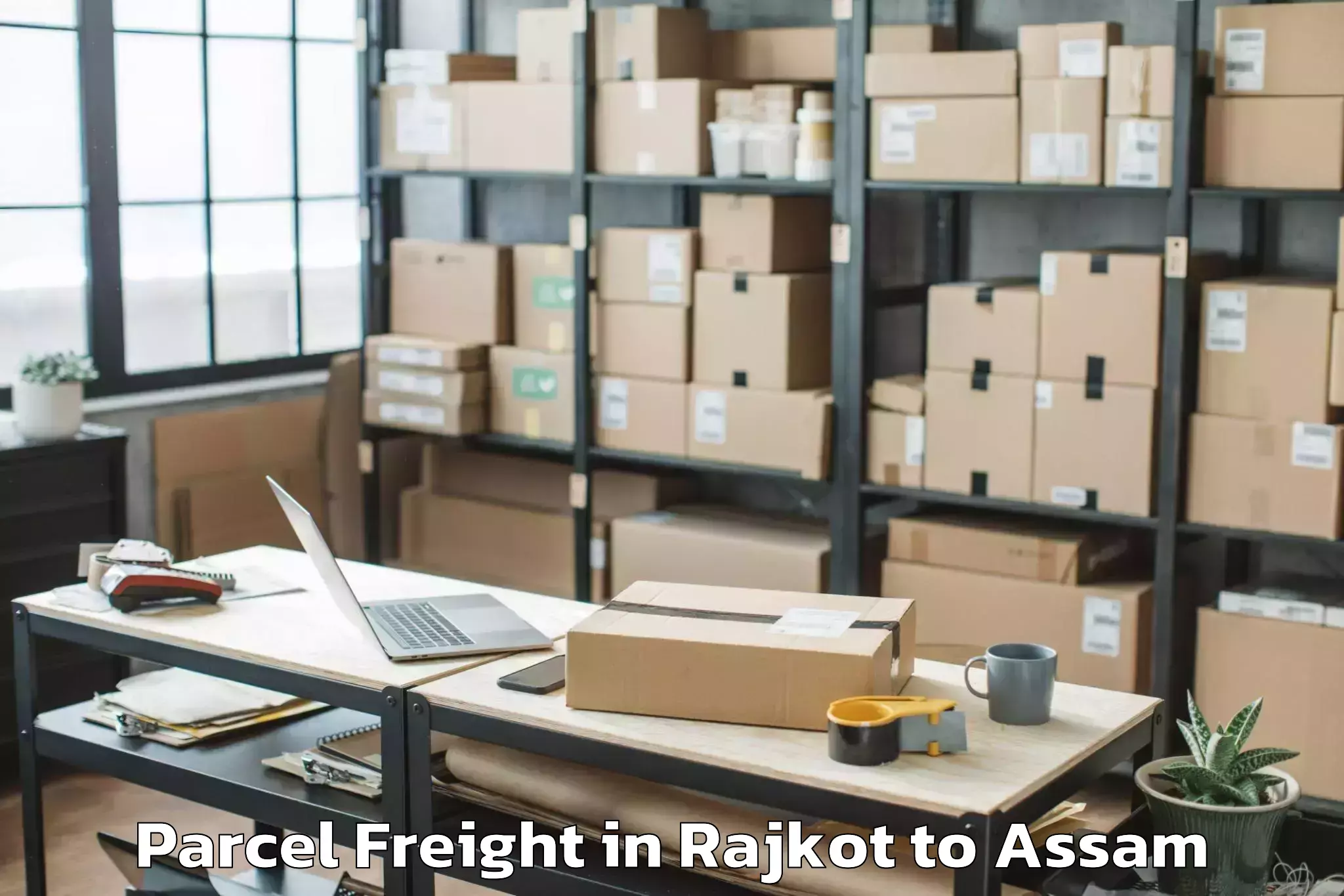 Easy Rajkot to Balighat Parcel Freight Booking